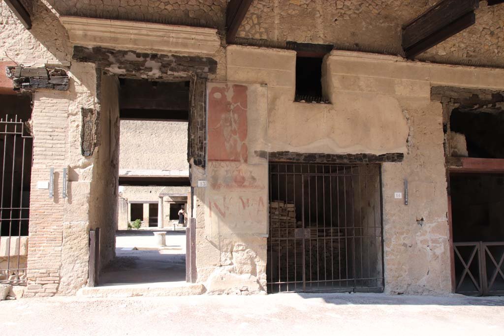 VI.13 Herculaneum, September 2021. 
Looking towards entrance doorway, centre left, on south side of Decumanus Maximus. Photo courtesy of Klaus Heese.
