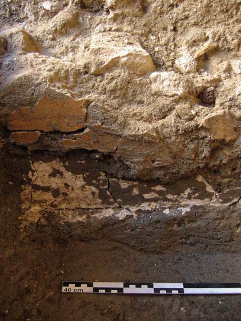 VI.14 Herculaneum. September 2005. 
Looking east, detail of lower level below painted plaster. Photo courtesy of Nicolas Monteix.

