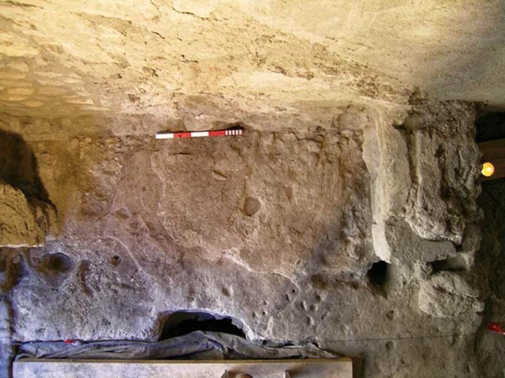 VI.15, Herculaneum. September 2005. Looking towards east wall, with stone base of steps, on right. 
Photo courtesy of Nicolas Monteix.
