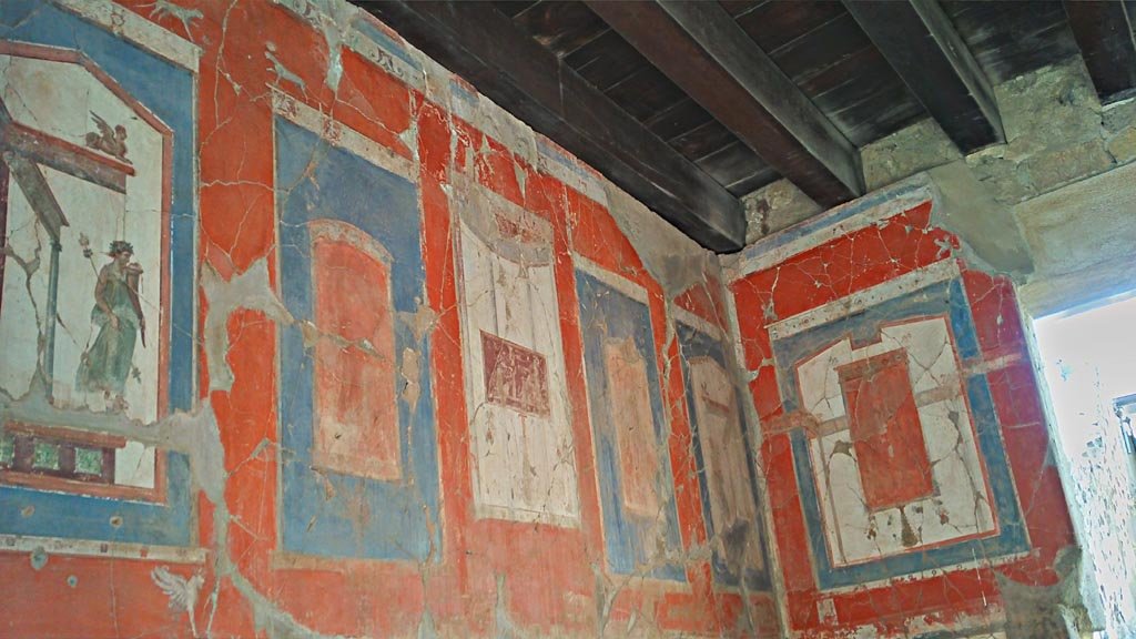 VI.16 Herculaneum. Photo taken between October 2014 and November 2019.
Detail of painted decoration on upper east wall and south-east corner. Photo courtesy of Giuseppe Ciaramella.

