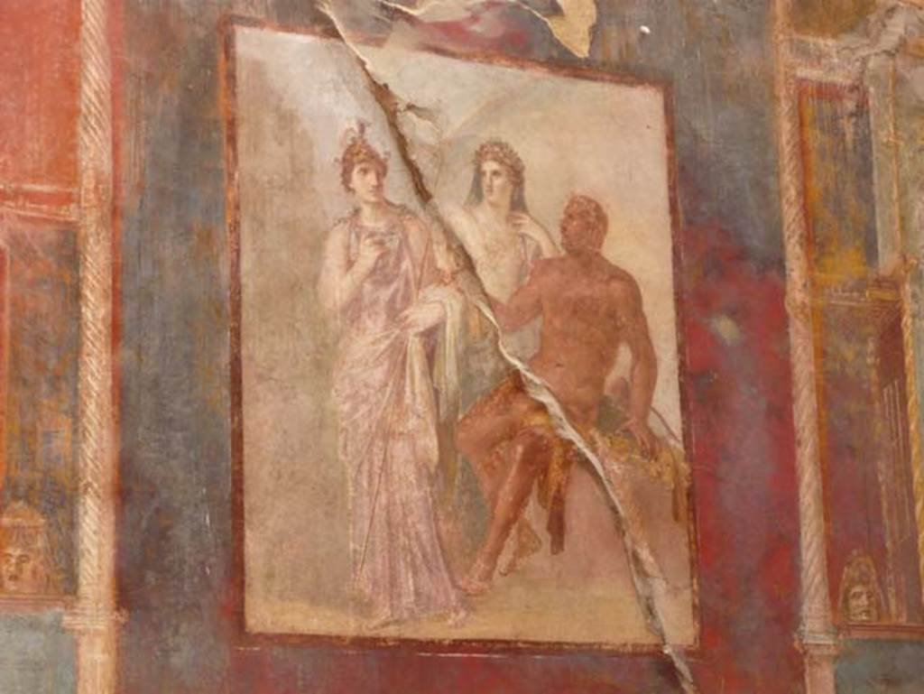 Ins.VI.21, Herculaneum. May 2009.  Wall painting on east wall of Hercules being welcomed to heaven by Minerva (on left with helmet) and Juno (on right). Photo courtesy of Buzz Ferebee.
