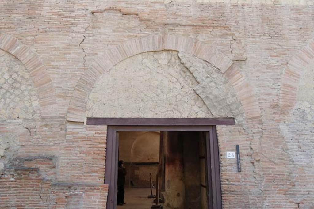 VI.24, Herculaneum. May 2011. Upper facade above entrance doorway. Photo courtesy of Nicolas Monteix.