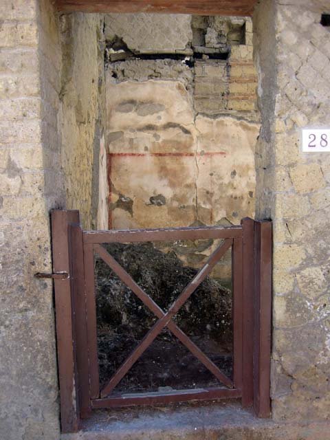 VI.28, Herculaneum, June 2011. Looking through entrance doorway towards site of stairs to upper floor. Photo courtesy of Sera Baker.
