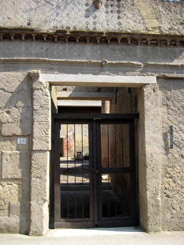 VI.29 Herculaneum. July 2009. Entrance doorway. Photo courtesy of Sera Baker.