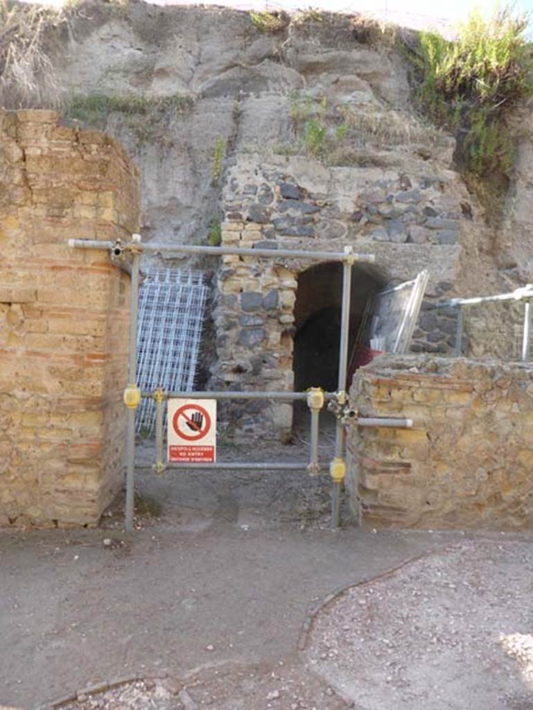 Ins. VII, Herculaneum, September 2015. Side doorway into Basilica Noniana on west side of Cardo III. Only the eastern perimeter wall has so far been brought to light together with two side doorways. 
