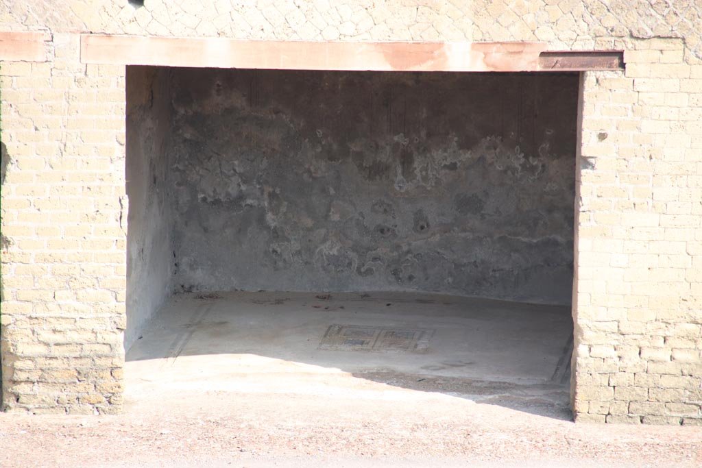 Ins. Or. I.1a, Herculaneum. October 2023. Taken from access roadway. Doorway into room C, an exedra. Photo courtesy of Klaus Heese.