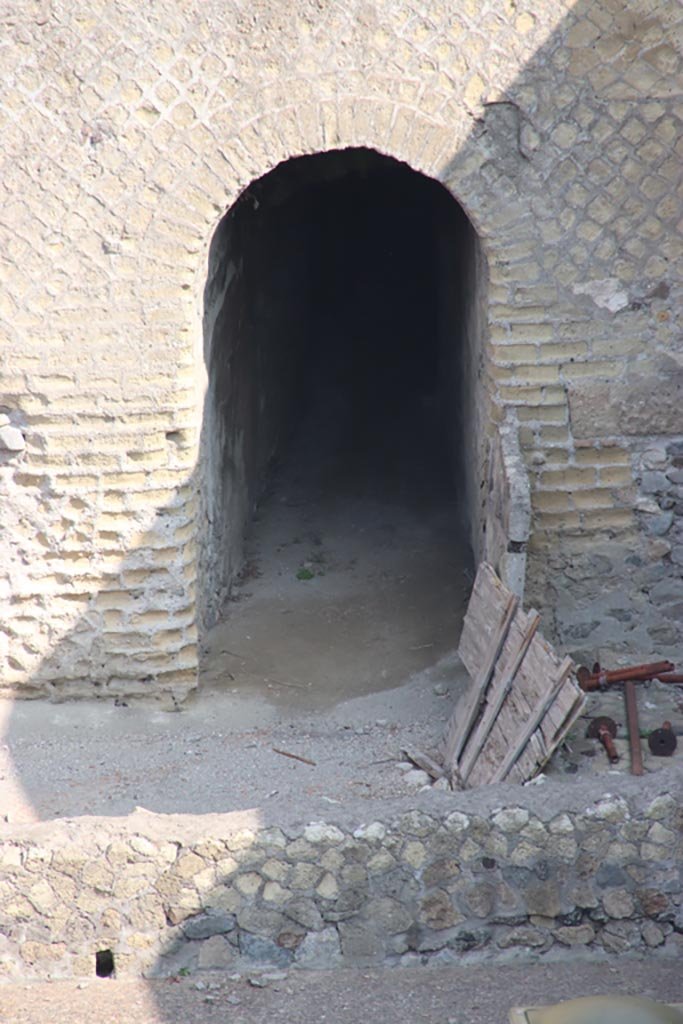 Ins. Or. I.1a, Herculaneum. October 2023. Taken from access roadway.
Looking north to doorway to room F, corridor leading to room G, services, kitchen/latrine, etc.
Photo courtesy of Klaus Heese.
