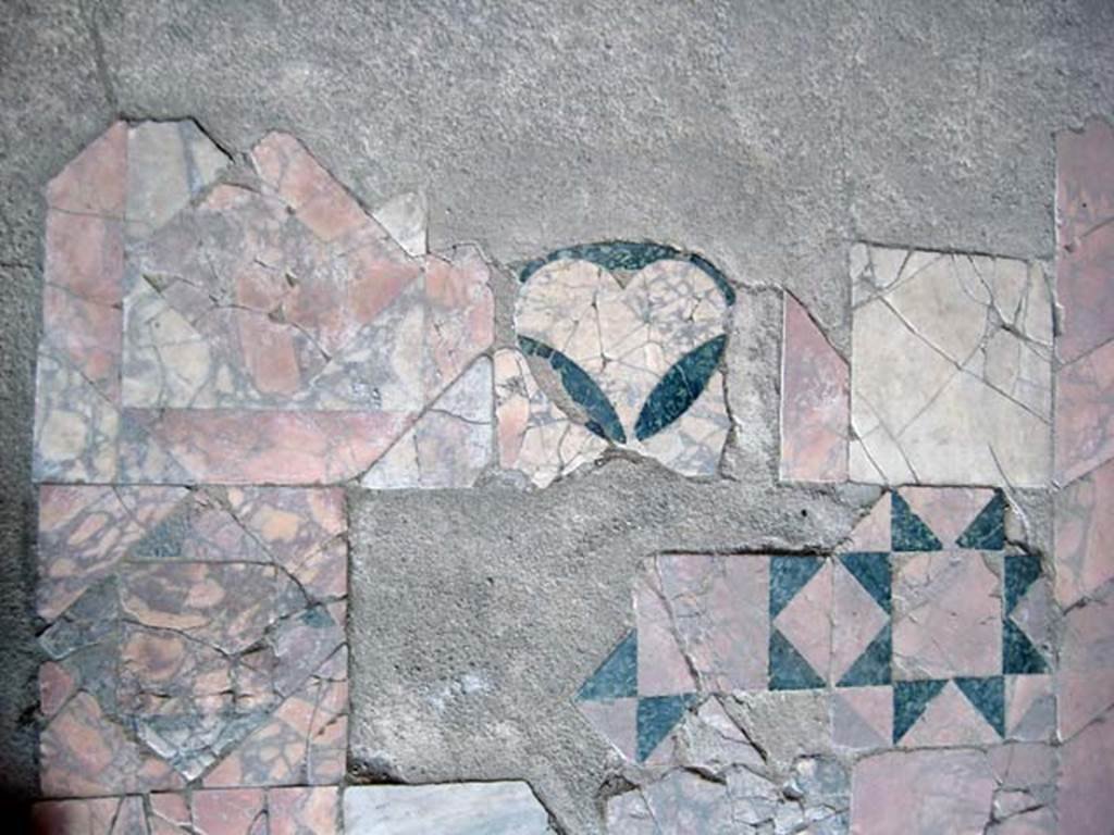 Ins. Or. 1. 2, Herculaneum. July 2009. Detail of opus sectile flooring in Marble Salon. 
Photo courtesy of Sera Baker.

