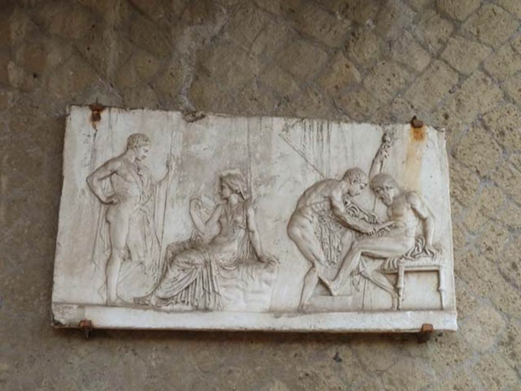 Ins. Orientalis I, 2, Herculaneum, September 2015. Plaster cast of the relief showing the myth of Telephus, son of Hercules. However, this copy of the original now in Naples Archaeological Museum, was not found in this location, but in one of the rear rooms.

