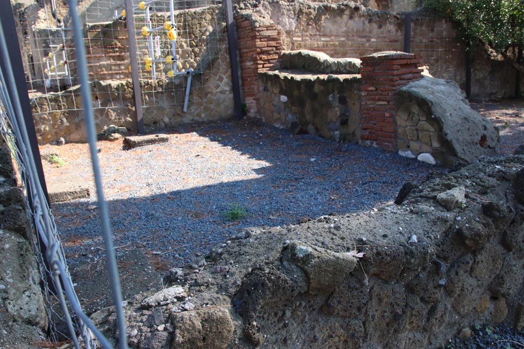 Ins. Orientalis I.3, Herculaneum, October 2022. 
Looking towards room C in north-west corner, on east side of Cardo V. Photo courtesy of Klaus Heese.

