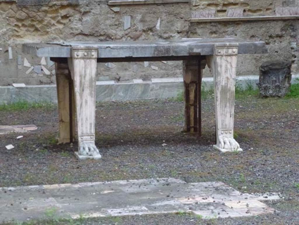 Ins. Orientalis II 4, Herculaneum, October 2012. Detail of marble table in apsed room. Photo courtesy of Michael Binns.