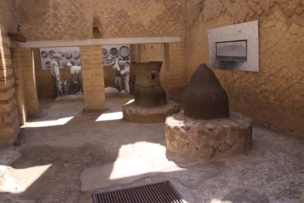 Ins. Orientalis II.8, Herculaneum. September 2019. Looking east across mill-room from entrance doorway.
Photo courtesy of Klaus Heese.
