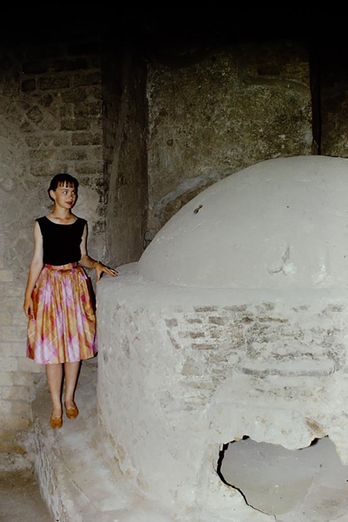 Ins. Orientalis II.8, Herculaneum. 1961. 
Oven with two stucco phalli above doorway. Photo by Stanley A. Jashemski.
Source: The Wilhelmina and Stanley A. Jashemski archive in the University of Maryland Library, Special Collections (See collection page) and made available under the Creative Commons Attribution-Non Commercial License v.4. See Licence and use details.
J61f0596
