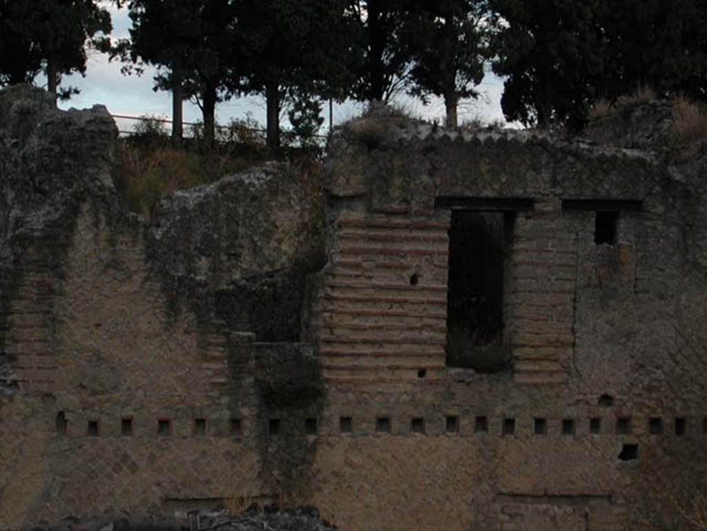 Ins Or II, 4, Herculaneum. September 2003. Upper floor, above doorways 8 & 9.  
Photo courtesy of Nicolas Monteix.
