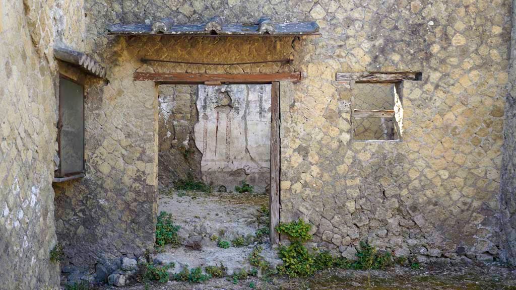 Ins. Orientalis II.16, Herculaneum. August 2021. 
Looking towards east wall with doorway to a rear room. Photo courtesy of Robert Hanson.
