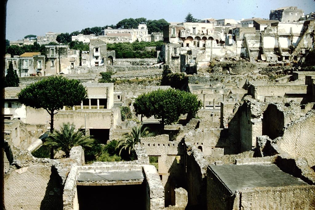Herculaneum, 1957. Rear of Ins. Orientalis II, lower part of photo. Looking west across site from access roadway. Photo by Stanley A. Jashemski. 
Source: The Wilhelmina and Stanley A. Jashemski archive in the University of Maryland Library, Special Collections (See collection page) and made available under the Creative Commons Attribution-Non-Commercial License v.4. See Licence and use details.
J57f0424
