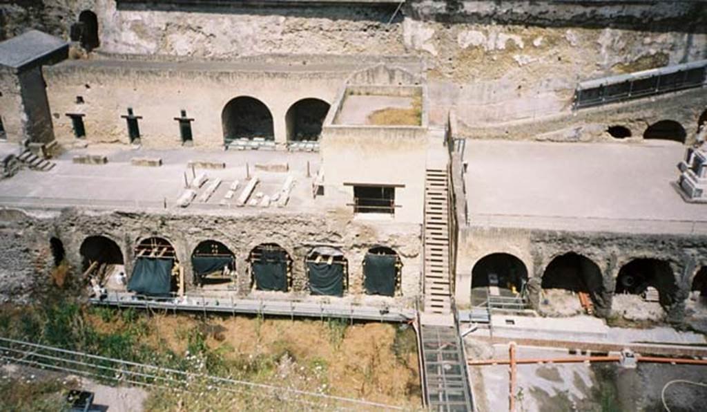 Herculaneum, May 2007. Looking north to lower level and arches of the boatsheds below the Sacred Area, on left, and Terrace of Balbus, on right. Photo courtesy of Buzz Ferebee.
