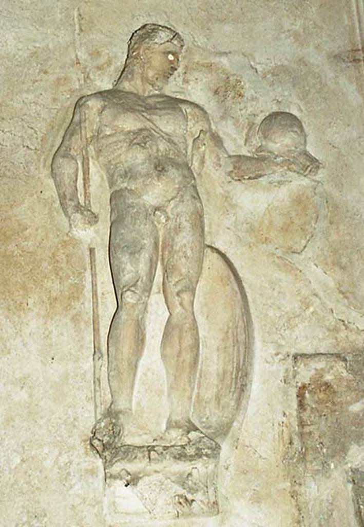 Suburban Baths, Herculaneum. October 2001. 
Detail of stucco warrior with spear, from west wall of tepidarium. Photo courtesy of Peter Woods.

