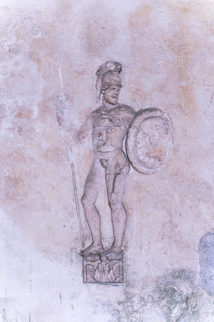 Herculaneum Suburban Baths. October 2023. 
Tepidarium, detail of stucco warrior from east side of north wall. Photo courtesy of Johannes Eber. 
