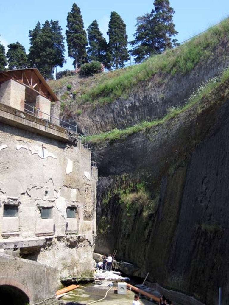 Suburban Baths, and beachfront, Herculaneum, July 2009. Exterior south side of Baths in south-east corner of site.  Photo courtesy of Sera Baker.
