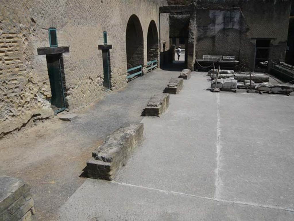 Herculaneum, August 2013. Sacred Area terrace, looking east across terrace.
The doorway, centre left, leading back to the Terrace of Nonius Balbus, and the one on the right into large room 7. Photo courtesy of Buzz Ferebee.
