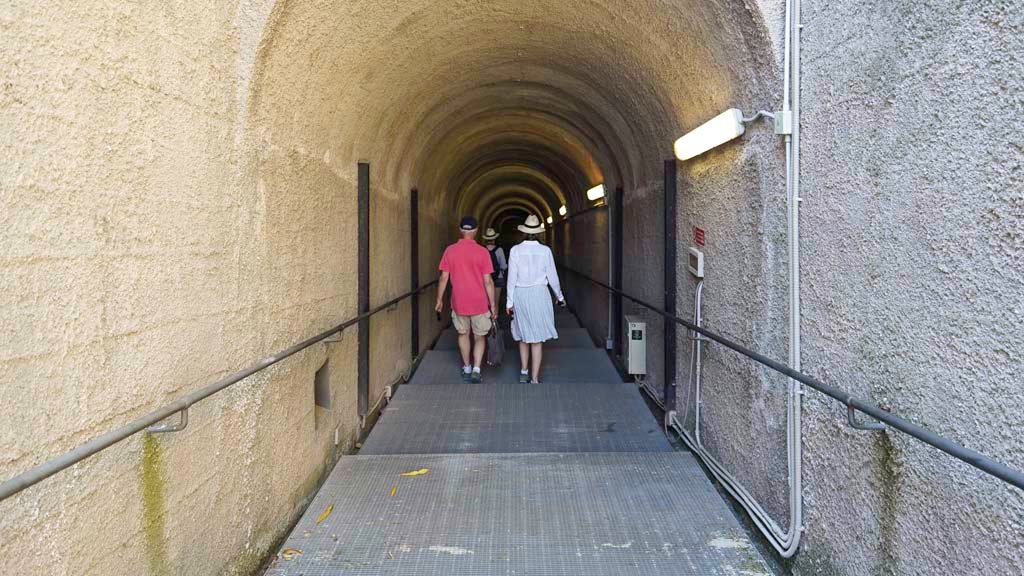 Herculaneum, August 2021. Ramp in tunnel leading down to the area of the beachfront. Photo courtesy of Robert Hanson.


