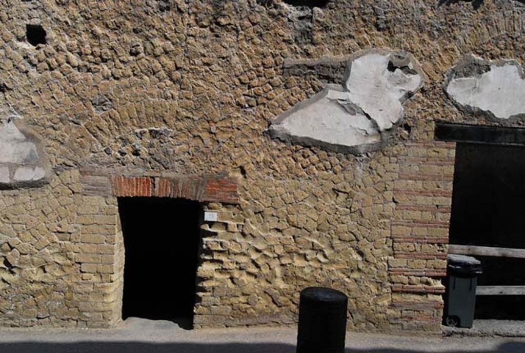 Cardo IV, west side, Herculaneum, June 2008. Exterior wall between VI.9, on left, and VI.10, on right.
Photo courtesy of Nicolas Monteix.

