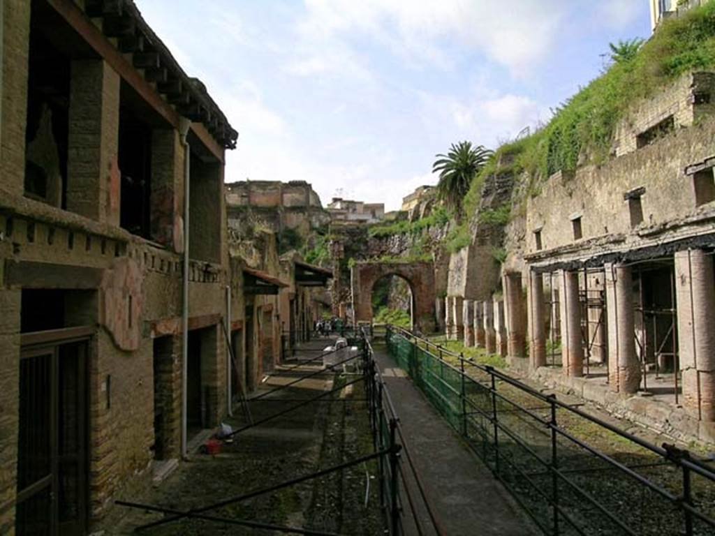 Decumanus Maximus, Herculaneum, June 2012. Looking west between Ins. V, on left, and north side of Decumanus Maximus, on right.  Photo courtesy of Michael Binns.

