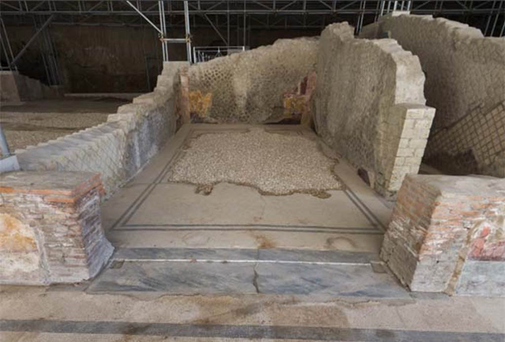 Villa dei Papiri, Herculaneum. 2009. Room (g). In the recent excavation carried out in room (g), a layer of residual collapsed material of about 1m square was found still piled up at its south-east corner. This layer contained the collapsed wall paintings which once decorated that corner of the room. 
It must be noted that due to the extreme frailty of the stratigraphic context and the complexity of the intervention aimed at recovering the plaster fragments, the excavation was carried out by the restorers with the help of the archaeologist in order to reconstruct the decorative apparatus. It was therefore possible to recover all the collapsed plaster fragments and to reconstruct almost completely the decorative scheme on the south-east corner of the wall.
See Esposito D. and Guidobaldi M., 2010. New Archaeological Research at the Villa of the Papyri, in the Villa of the Papyri at Herculaneum. Berlin: De Gruyter, p. 26, fig. 6, fig. 7, note 8. 
