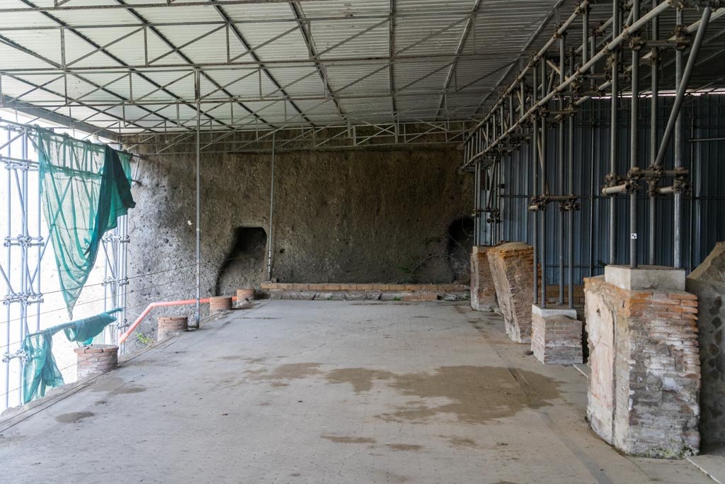 Herculaneum Villa dei Papiri. October 2023. 
Looking west along large loggia/walkway (a) from room (b), on right. Photo courtesy of Johannes Eber. 

