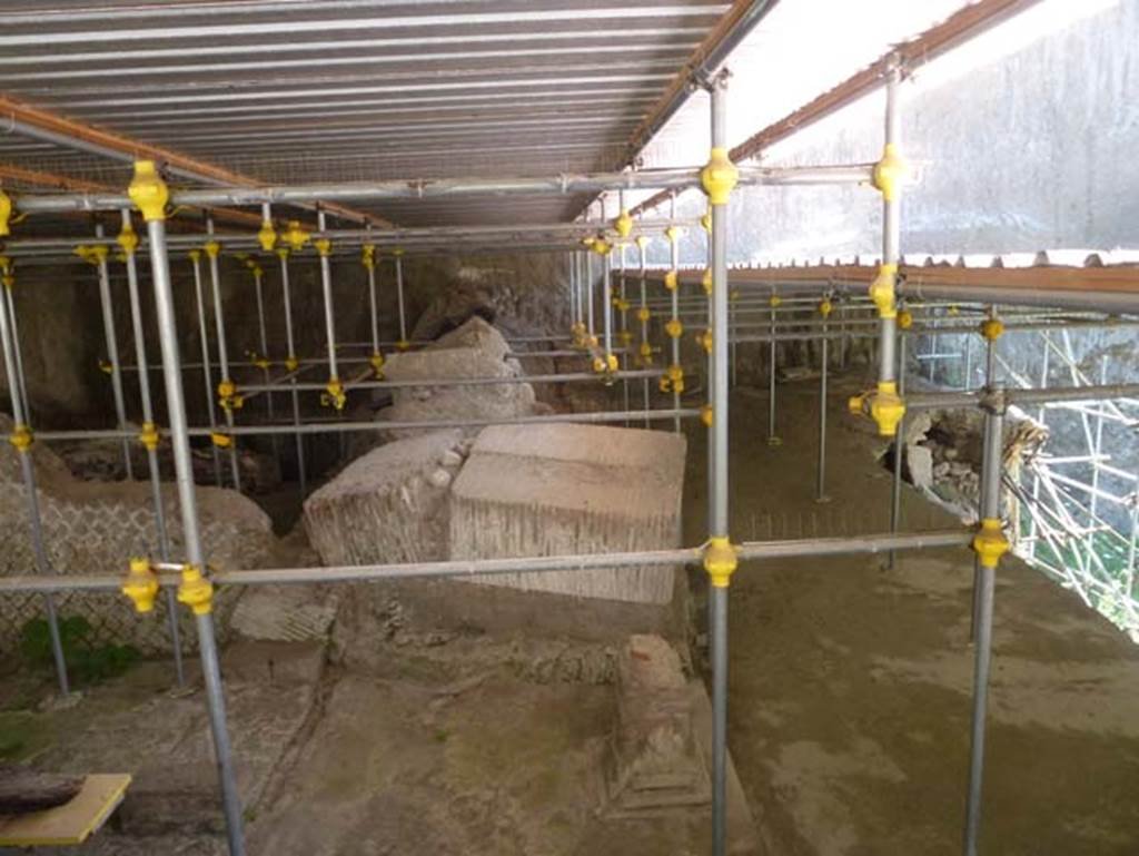 House of Dionysiac Reliefs, Herculaneum, seaside pavilion, June 2012. Looking north along collapsed portico (e) and terrace (f).
Photo courtesy of Michael Binns.


