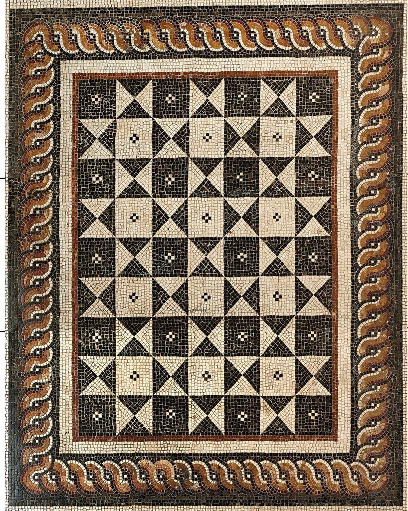No.1 - Detail of central mosaic in photo above.
“A Second Style composite pavement at Portici in opus tessellatum consisting of 63 squares (7 x 9) of alternating positive and negative geometrical space in black and white tesserae, creates the optical illusion of superimposed rotated dotted squares.
The central panel is surrounded by a long band of braided guilloche in white, yellow and red on a black background.”
See Papaccio, V. The floors of the Villa dei Papiri. (p.56-63, of Buried by Vesuvius, the Villa dei Papiri at Herculaneum, edited by Kenneth Lapatin). 
Photographed at Reggia di Portici, October 2013. Mosaic pavements in Royal Apartments. 
Photo courtesy of Frédérique Marchand-Beaulieu and Helen Dessales.
©Villa Diomedes Project, Image database, http://villadiomede.huma-num.fr/bdd/images/5292 
