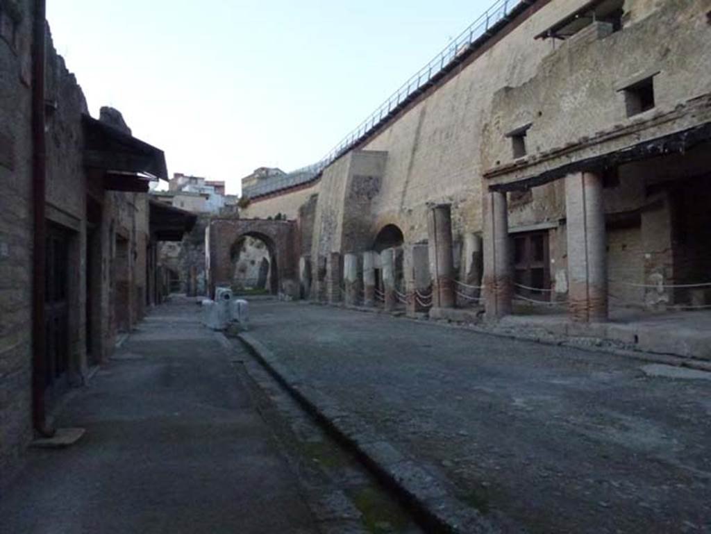 Decumanus Maximus, Herculaneum. October 2012. Drainage channel on south side. Looking north-west along roadway. 
Photo courtesy of Michael Binns. 
