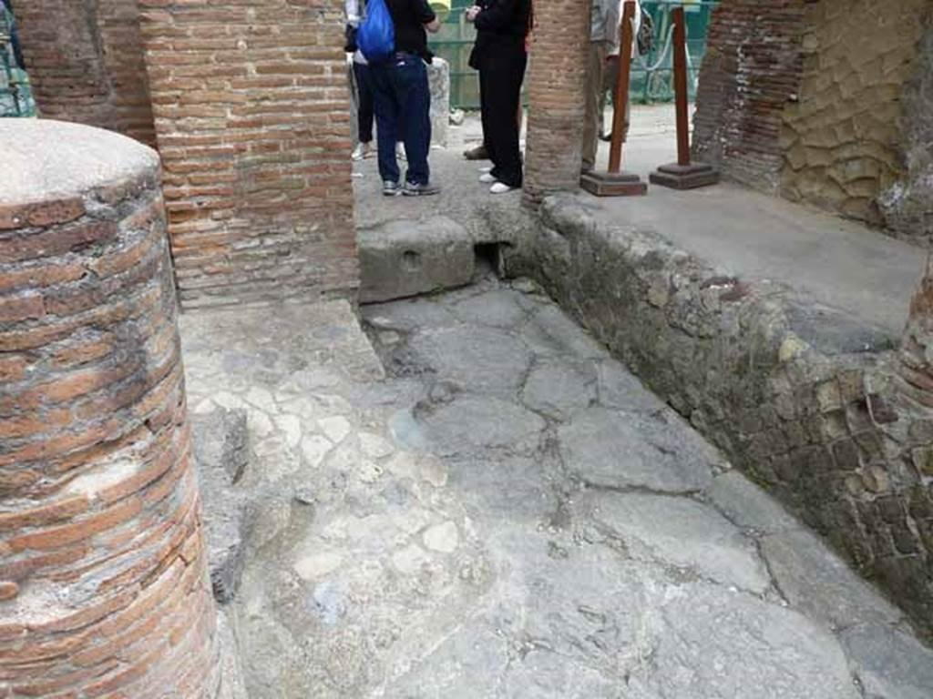 Looking north on Cardo IV, with junction of Decumanus Maximus, Herculaneum. May 2010.